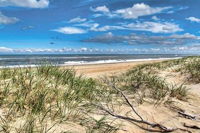 Sandee Sand Bay Beach Photo