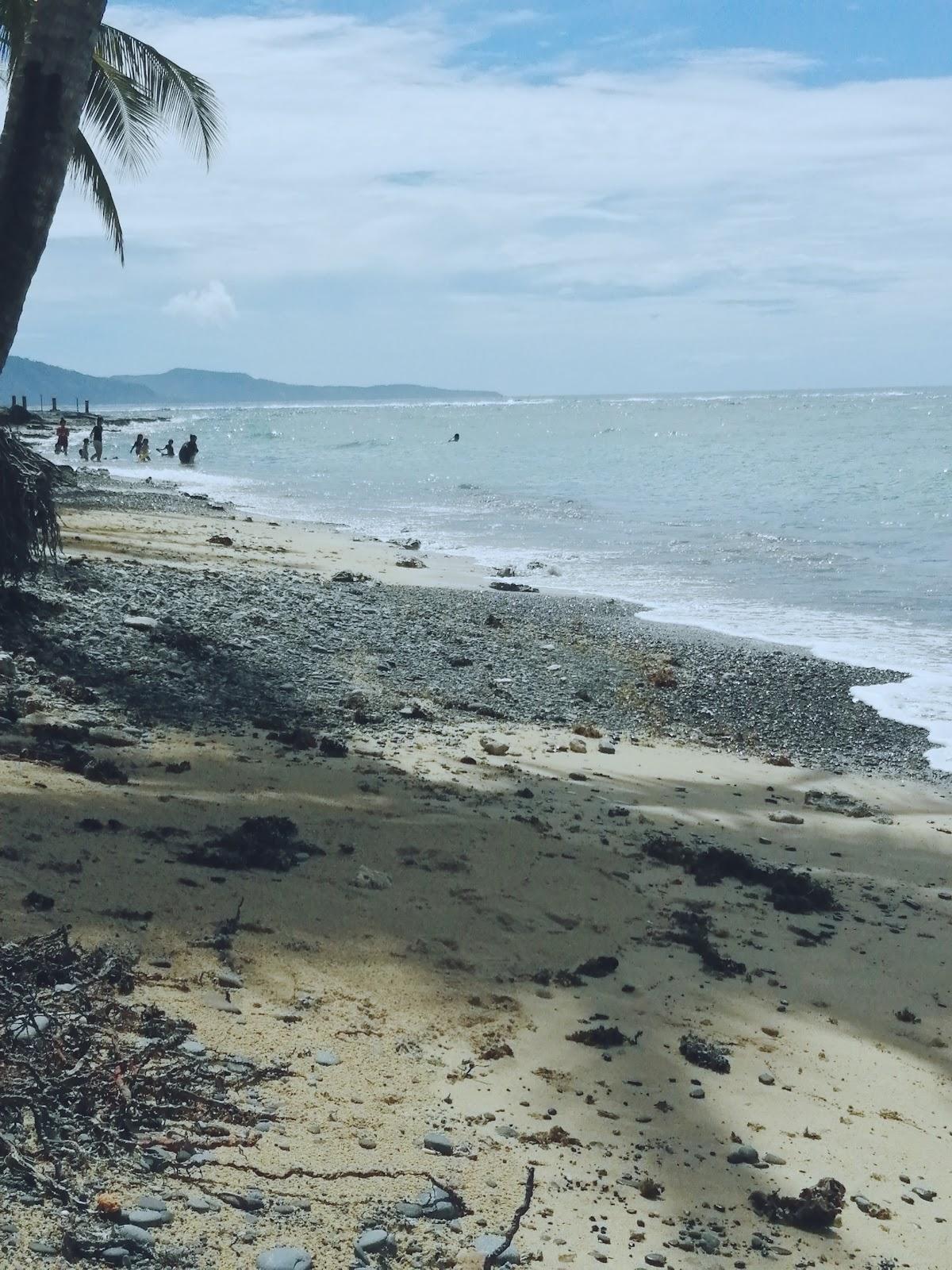 Sandee Cadanlaan Beach Line
