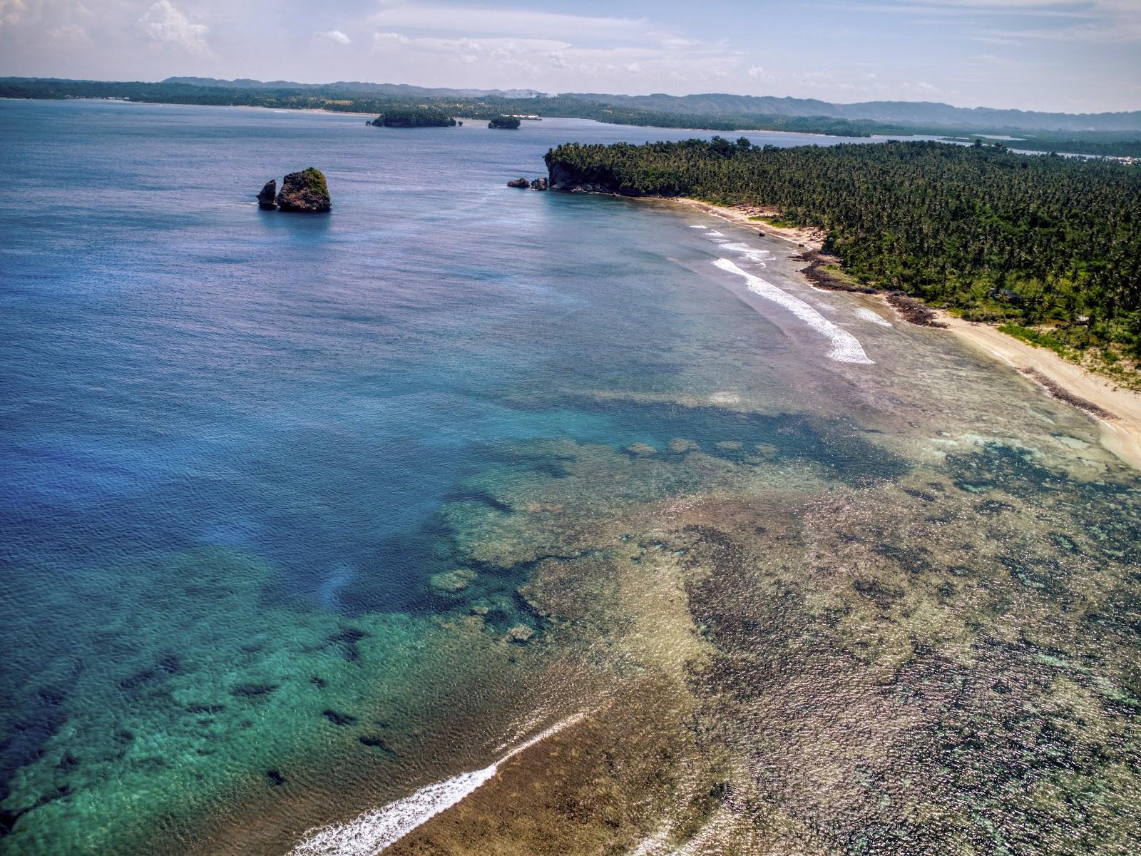 Sandee - Magpupungko Beach