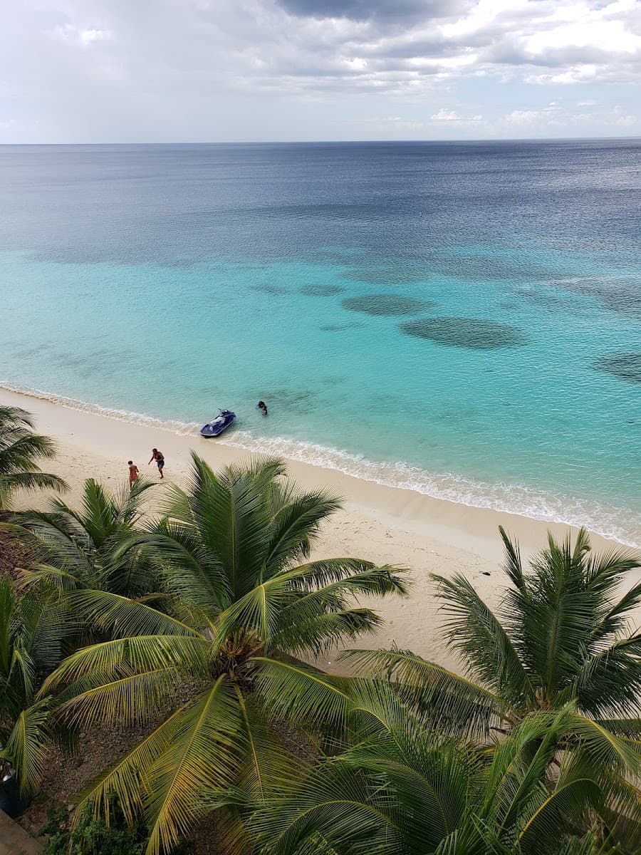 Sandee Amaniy Beach And Hotel Photo