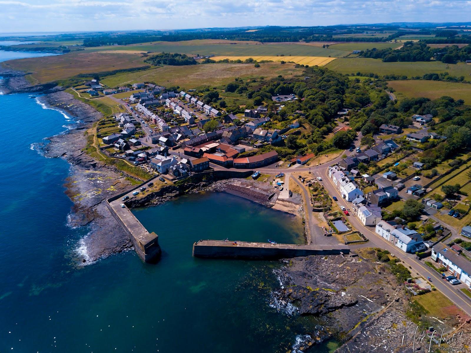 Sandee Craster Beach