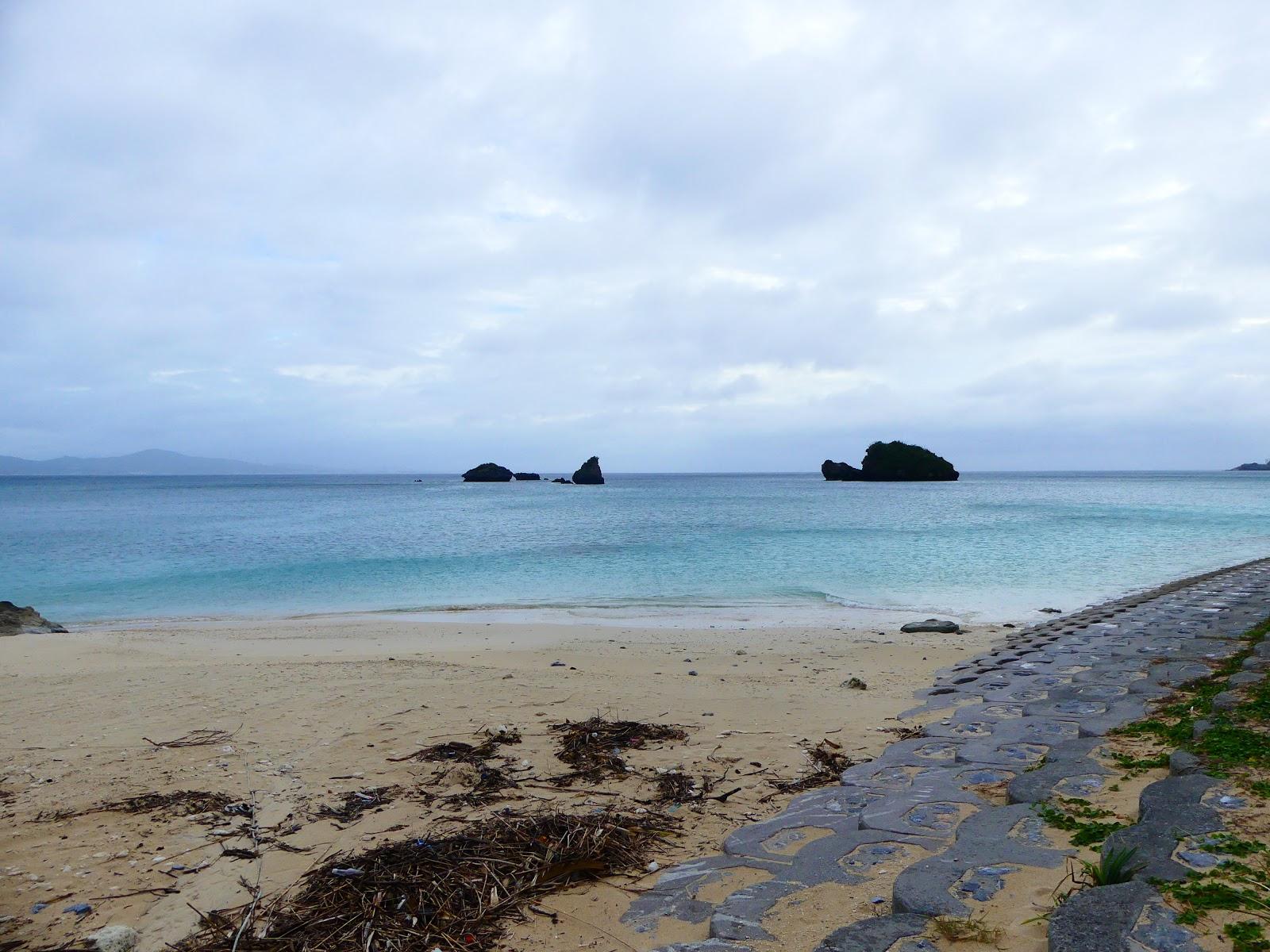 Sandee Lyso Nekksu Nago Beach Photo