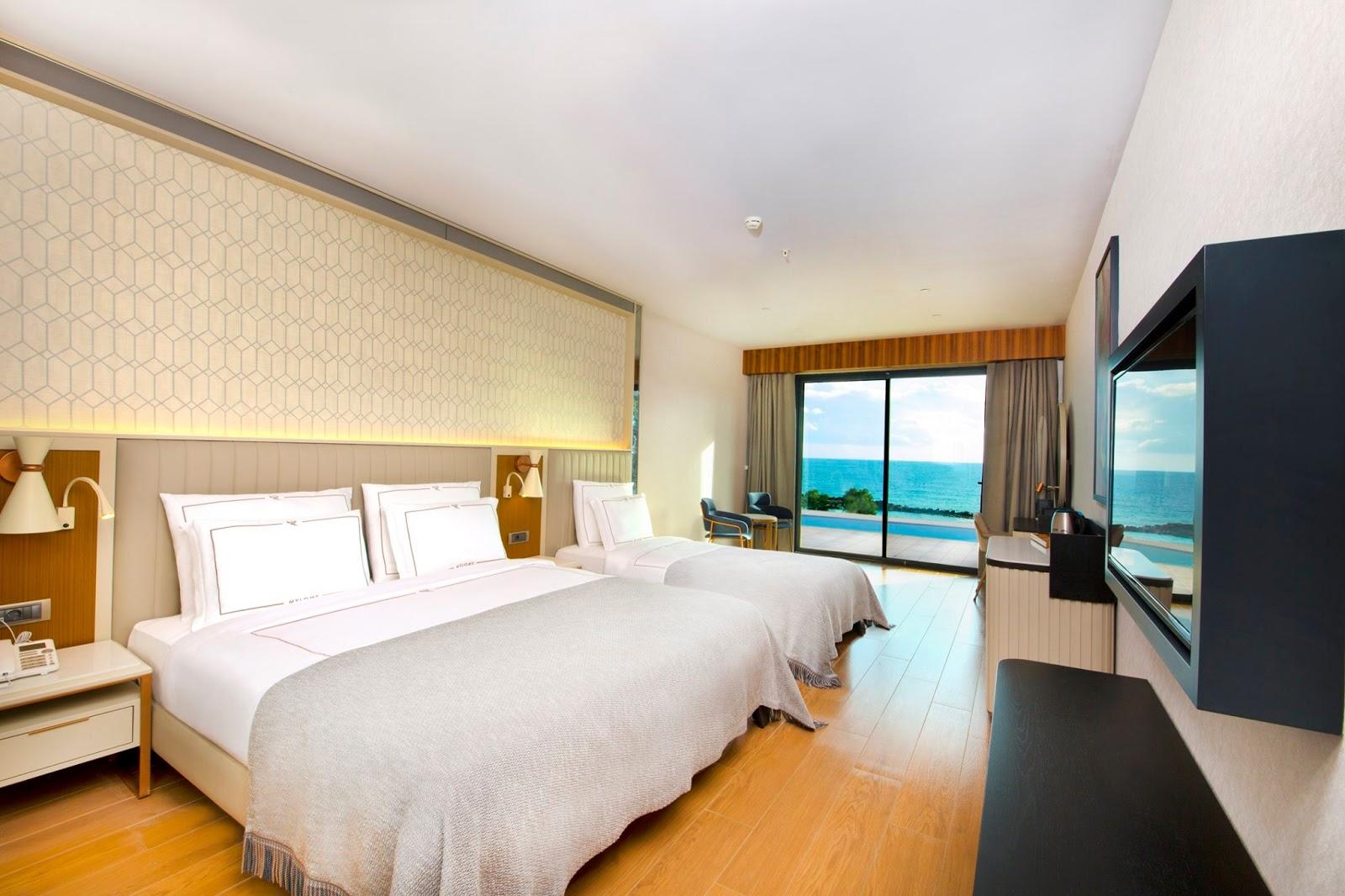 Sandee Mylome Luxury Hotel & Resort Beach Photo